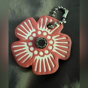 Coach leather flower hang tag